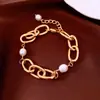 Pulsera de Cadena con Perlas Chapada en Oro Real de 18 Quilates Europea y Americana con un Diseño Único, Pulsera de Nicho, Joyería de Moda y Tendencia para Mujeres