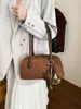 Bolso tipo baguette de gamuza a la moda para mujer, nuevo modelo 2026, bolso de gran capacidad para el día a día, bolso de hombro Boston retro casual