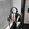 Nova Bolsa Transversal Tendência de Ombro Único 2026 Moda Casual Personalidade Bolsa Concha Primavera Design de Nicho Bolsa Feminina