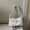 Otoño 2026 Gran Capacidad Nueva Moda Hebilla de Pin de Alta Calidad Diseño de Nicho Elegante Versátil Bolso de Hombro de Mano