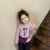 Conjunto de Ropa de Otoño para Niñas 2026 Nuevo Estilo Coreano de Moda con Estampado, Manga Larga, Ropa de Trabajo con Pantalones Acampanados, Conjunto de Dos Piezas Tendencia