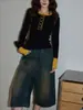 Camiseta Elegante Preta de Gola Redonda com Recortes para Mulheres Outono 2025 Cintura Definida Manga Longa Azul