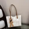 Bolsas Femininas de Nicho Estilo Coreano Transfronteiriças Novo Modelo 2026 Bolsa de Ombro para o Dia a Dia Estilo Chanel Bolsa Tote de Grande Capacidade