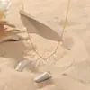 Colar de corrente de clavícula com pingente pequeno de pérola francesa elegante INS pérola pequena contas de arroz borla colar de aço titânio sem desbotamento