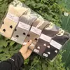 26 Calcetines Caídos de Media Pantorrilla para Mujer Otoño Invierno Calcetines de Pelo de Camello Calidez para Mujer Otoño Invierno Venta al por Mayor