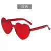 Nuevas Gafas de Sol Color Caramelo Amor Mujer Corazón de Melocotón Tendencia Personalizadas Sin Marco Verano Gafas de Sol Promocionales de Fábrica Hombre