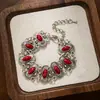 Pulsera vintage plateada-roja turquesa desgastada con patrones huecos de estilo étnico y cadena ajustable, pulsera para mujer al por mayor