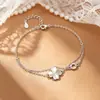 Pulseira de Trevo de Quatro Folhas em Camadas Duplas de Prata S990 para Mulheres, Alto Padrão, Luxo Leve, Design de Nicho, Joia Pendente Redondo Exquisita com Numerais Romanos