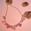 Conjunto de Joyería Flor de Ciruelo Rosa Colección Privada, Estilo Juvenil Collar y Aretes, Directo de Fábrica, Disponible a Precios de Mayoreo