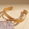 Pulsera Abierta Geométrica de Capas Cruzadas con Brillo Metálico Europea y Americana con un Toque Único Minimalista de Nicho de Alta Gama, Joyería Transfronteriza