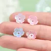 Pequeño accesorio de flor de cinco pétalos perforada hecho de material acrílico para aretes DIY, clips para orejas, pulseras, abalorios y materiales de pintura decorativa