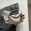 Bolso de Mano Relajado y Elegante Estilo Coreano, Bolso de Hombro Cruzado Fresco y Dulce de Nicho de Moda, Bolso Dumpling Moderno y Único
