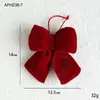 Decoraciones navideñas de terciopelo rojo transfronterizas en stock con lazo tridimensional, adornos para árbol de Navidad, decoraciones para ventana