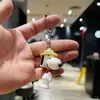 Llavero de cachorro lindo de dibujos animados, muñeco de plástico blando tridimensional, accesorio para mochila, llavero de coche, regalo pequeño, venta al por mayor