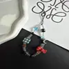 Cadena para teléfono estilo Ins con estrellas rojas, cordón para funda de teléfono de rugby, accesorio de cadena para cámara con cuentas DIY