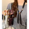 Collar de Bufanda de Seda con Perlas de Lunares Retro para Mujer 2026 Nueva Llegada Diseño de Nicho Cadena para Colgar en el Cuello de Suéter Capa Exterior para Superponer