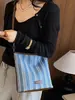 Bolsa de moda listrada de grande capacidade para mulheres 2026 nova bolsa tote de ombro casual moda executiva bolsa de balde tendência