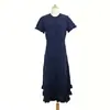 Vestido de Punto Hueco de Color Sólido Estilo Nuevo de Verano con Cuello Redondo, Mangas Cortas, Volantes Multicapa y Dobladillo Amplio, un Artículo de Moda