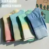 Novas meias tie-dye em cor degradê femininas de cano médio quatro estações outono e inverno ins moda estilo faculdade simples cor doce meias esportivas