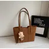 Bolsa Feminina Transfronteiriça Retrô de Grande Capacidade 2026 Novo Estilo Coreano High-End Elegante Bolsa de Ombro Única Versátil para o Dia a Dia Bolsa Tote
