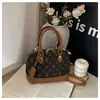 Bolso de Mujer de Alta Gama Estilo Chanel 2026 Modelo Nuevo Acolchado Bordado Bolso de Cadena Bolso Cubo con Cierre de Cordón Bolso de Hombro Único Bolso Cruzado