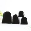 High-end preto veludo saco cordão cordão flocante óculos de pano fone de ouvido móvel armazenamento de energia embalagem saco de presente