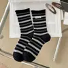 Calcetines de tela retro a rayas para otoño e invierno para mujer, hasta la pantorrilla, calcetines apilados con borde enrollado estilo coreano, versátiles, transpirables, cálidos, calcetines de moda