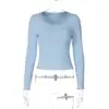 Ropa de Mujer Popular de Europa y América 2026 Otoño Nuevas Llegadas Moda Ribete de Encaje Ajuste Delgado Camiseta de Manga Larga Top de Color Sólido Venta al por Mayor