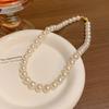 Collar de perlas nuevo coreano para mujer, lujo ligero, nicho, cadena para la clavícula de cuentas de alta gama, accesorios barrocos retro al por mayor