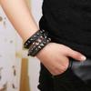 Pulsera punk de cuero directa de fábrica joyería periférica de anime al por mayor pulsera de piel de vaca europea y americana pulsera de remaches