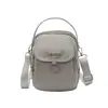 Bolso bandolera moderno y elegante para mujer, bolso de hombro de color liso, nuevo bolso para teléfono de estilo coreano casual y simple primavera 2026
