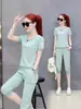 Traje deportivo Mujer Verano Nuevo Camiseta Moda talla extra Pantalones Capri de Manga Corta Casual Holgado Adelgazante Conjunto de Dos Piezas