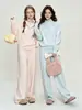Conjunto casual de punto de color liso para mujer, nueva colección otoño/invierno 2026, con un suéter de media cremallera y pantalones de pierna ancha de cintura alta, un conjunto de dos piezas