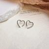 Moda europea y americana metal aretes de lujo ligero transfronterizos más vendidos aretes de temperamento simple aretes de personalidad de nicho venta al por mayor