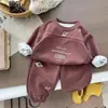 Conjunto de Moletom Casual com Gola Redonda para Crianças na Primavera 2026 Nova Moda Estampa de Letras Conjunto de Duas Peças Soltinho para Meninos e Meninas