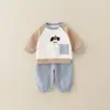 Ropa de Otoño para Niños Estilo Coreano 2026 Nueva Moda Linda Ropa Exterior de Algodón Puro con Dibujos Animados para Niños Conjunto de Dos Piezas de Primavera
