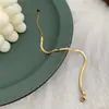 Tornozeleira de corrente com lâmina 3MM estilo europeu e americano material aço titânio não fácil de desbotar banhado a ouro 18K corrente de cobra plana B03