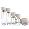 En Stock Entrega Rápida Botella de Vidrio de Alta Transparencia de 30 ml con Tapa Blanca y Anillo Dorado, Botella Atomizadora de Esencia de Crema, Botella Vacía para Set de Cosméticos