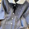 Nuevo suéter de punto para mujer de otoño e invierno, estilo transfronterizo, con cuello de muñeca y lazo de encaje, top elegante y de alta gama estilo francés
