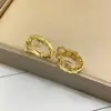 Versión Alta Pendiente Serpiente Oreja Baojia Moda Lujo Ligero Taladros Cabeza y Cola Dos Círculos Taladros Completos Artesanía de Precisión CNC Pendiente Serpiente de Temperamento Zodiaco