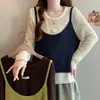 Foto real da loja: Conjunto de duas peças: top de malha de manga longa com blocos de cor, tamanho grande, estilo casual, para o Outono/Inverno 2026 + camisola