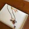 Collar con colgante de frijol de café de madera estilo coreano, cachorro y oso, cadena para la clavícula simple, a la moda y versátil, accesorio de diseño nicho