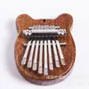 Mini piano de pulgar de 8 tonos de cristal pequeño lindo fácil de llevar mini colgante de celebridad de internet mini instrumento musical al por mayor