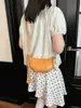 Bolso de axila de moda y chic estilo francés, bolso de cuerno elegante y único, nuevo modelo 2026, alto valor estético, bolso de mano simple y casual para mujer