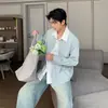 Camisa masculina de outono estilo coreano, fresca e solta, de manga longa, moderna e única, camisa versátil de falso duas peças para jovens homens