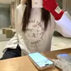 Camiseta suelta de manga larga estilo coreano para mujer, otoño e invierno 2025, seda de leche, top de longitud media estilo ins, venta al por mayor transfronteriza para mujer