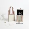 Caja de embalaje caja de aretes caja de collar caja de pulsera caja de anillos bolsa de mano paño para limpiar plata agua para limpiar plata una generación de 001
