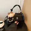 Bolso coreano de nicho, nueva moda verano 2026, bandolera de color sólido texturizado, bolso de mujer elegante de alto valor