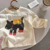 Camiseta de manga larga de algodón puro unisex, nueva colección primavera/otoño 2026, camiseta de bebé elegante, diseño de dibujos animados para niños mayores