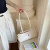 Bolsa de Axila com Textura Trançada Branca de Alta Qualidade para Mulheres 2026 Verão Nova Moda Versátil para o Dia a Dia Bolsa de Ombro